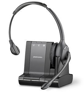 A sophisticated black Poly Savi W710 3-in-1 Over-the-Head Mono UC DECT 6.0 Wireless Headset (83545-01) by Plantronics, featuring a single earpiece and an adjustable microphone attached to a charging base. It showcases the Plantronics logo and three indicator lights, designed for use in professional settings with flexible connectivity options.