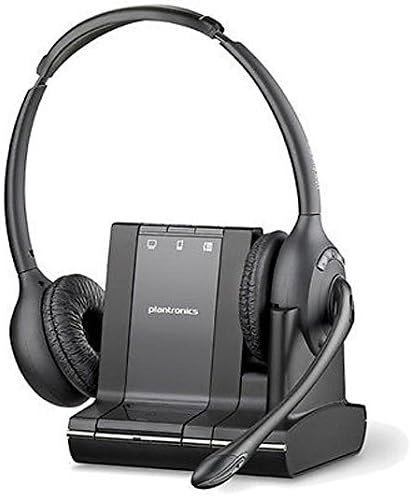 A black Plantronics Savi W720 DECT Wireless Headset, featuring a dual-ear design with cushioned ear pads and a noise-canceling microphone, rests on its sleek charging stand. The stand prominently displays the brand name "Plantronics" on the front and offers 3-way connectivity for various devices.