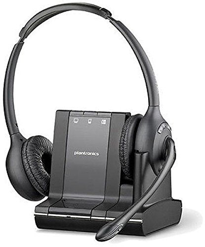 A black Plantronics Savi W720 DECT Wireless Headset (83544-01) with a noise-canceling boom microphone rests on its charging dock. The headset features cushioned ear pads and an adjustable headband. The charging dock, labeled "Plantronics," includes buttons for 3-way connectivity options.