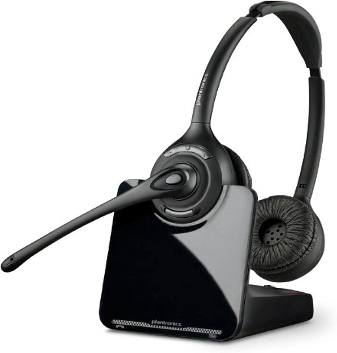 A Plantronics CS520-XD Wireless Headset - DECT, Black (Part #88285-01) with a boom microphone is placed on its charging stand. The premium audio headset has cushioned earpads and the brand "Plantronics" is visible on both the headset and the stand. The sleek, modern design also features superior call management capabilities.