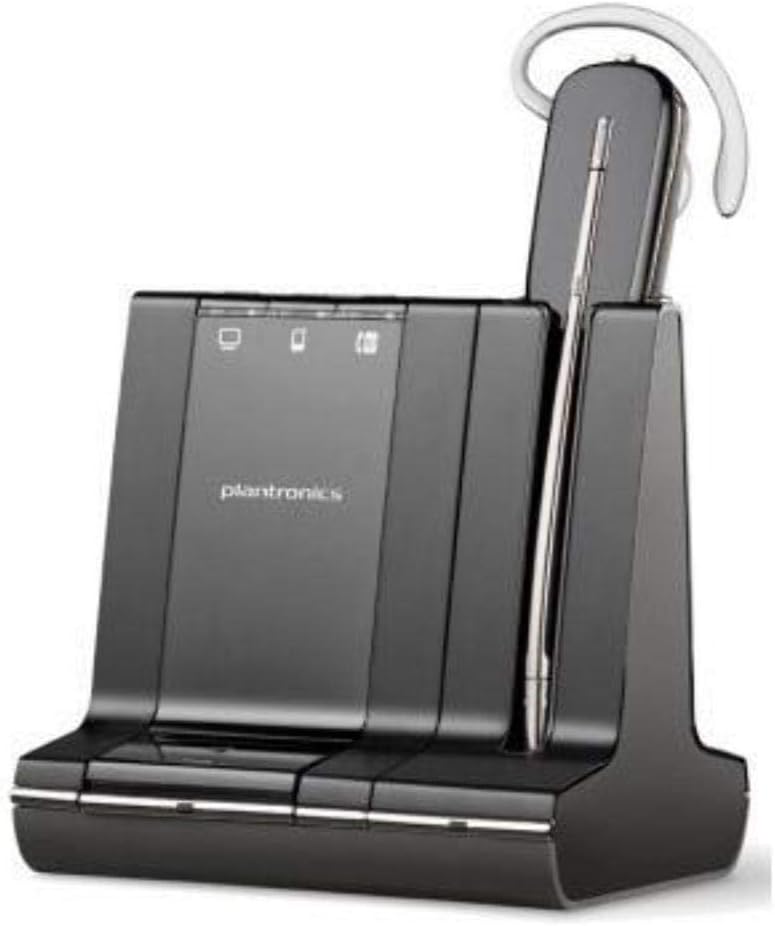 A Plantronics W740-M Savi 3in1 Convertible Moc Dect 6.0 (84001-01) wireless headset rests on its charging base. The sleek black design features a curved earpiece and a small microphone. The base, perfect for an office wireless headset, includes buttons and indicators for power and 3-way connectivity.