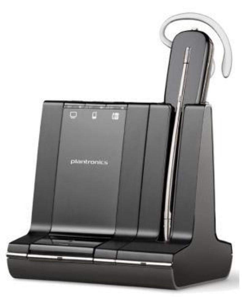 The Plantronics W740-M Savi 3in1 Convertible Moc Dect 6.0 (84001-01) is a black wireless office headset system that offers 3-way connectivity. The unit comes with a docking station equipped with buttons and LED indicators, along with a stylish wireless headset featuring an ear hook, positioned vertically on the right side of the dock.