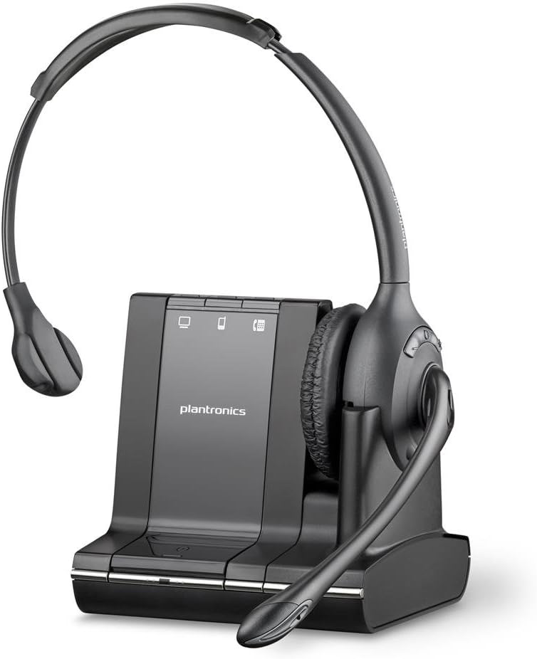 The Plantronics Savi W710-M Over-the-Head Mono Wireless Headset (84003-01) in sleek black rests on its charging base, engineered for clear communication. It features a single ear cushion and a noise-canceling microphone boom. The versatile base includes three call control buttons and status indicators for flexible connectivity.