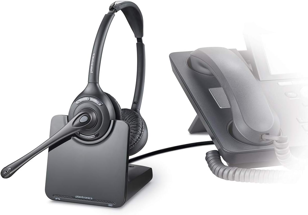 A Plantronics PL-CS520 Binaural Wireless Headset System, Black/Silver (Part # 84692-01) is resting on a charging stand. Next to the headset stand is a traditional wired telephone with a coiled cord. Both devices have a modern, sleek design.