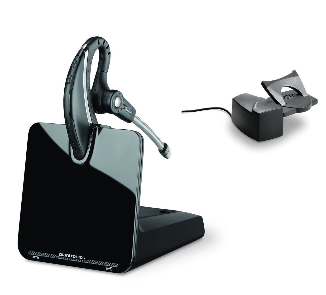 A Plantronics CS530 Office Wireless Headset with Extended Microphone and Handset Lifter (86305-01 + HL10) in black is resting on its charging base. The over-the-ear design features a microphone boom, and next to the headset and base sits a small electronic device with a wire, likely the HL10 Handset Lifter.