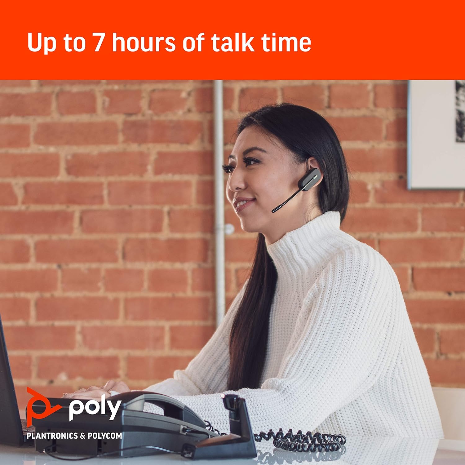 A person wearing a white sweater sits at a desk using a Plantronics CS540 XD Wireless Headset connected to a phone. The wall in the background is brick, with a partially visible framed picture. Text at the top reads, "Up to 7 hours of talk time." Branding at the bottom mentions "Poly" and "PLANTRONICS & Polycom.