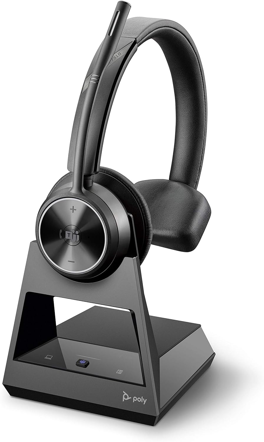 A sleek Office Wireless Headset with a black and silver design, the Poly Savi 7310-M Ultra-Secure Wireless DECT Headset System, Microsoft Teams Certified (215202-01), is displayed on its charging stand. The stand features a small button and blue indicator light, with "Poly" branding visible at the base. This Plantronics DECT headset comes with a cushioned ear pad and an adjustable microphone.